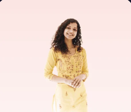 A young woman in a yellow kurta.